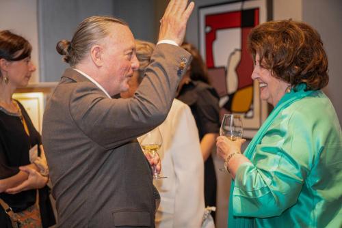 Dr. Phillip Heeb, Caribaea Initiative, and Chantal Comte, Caribaea Initiative, auction donor Rhum